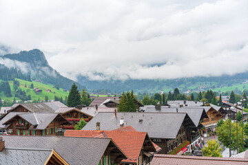 Chalets in the village of Gstaad in autumn time