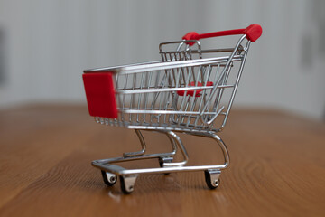 Shopping cart on modern background.