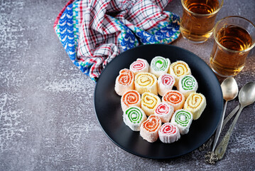 Turkish delight, Oriental sweetness on a plate with tea
