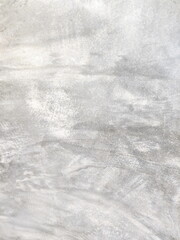 Vertical image of gray concrete wall with uneven color Concrete floor for antique cement wall background Copy space for text

