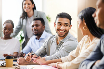 That went well, wouldnt you say. Cropped shot of a handsome young businessman sitting with his...