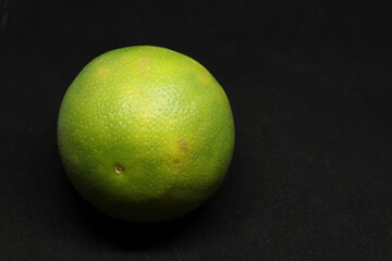 closeup shot sweet lime(citrus fruit) mosambi. with background