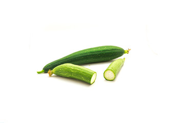 Organic whole luffa (smooth sponge loofah) fruit with two half cuts isolated on white background