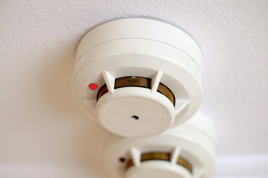 Rescue on fire. Standalone smoke detectors mounted on the ceiling
