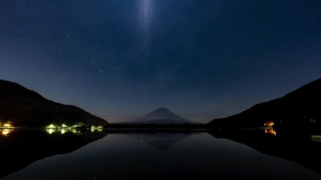 Night sky time laps at mountain Fuji by the lake with peaceful lake reflection