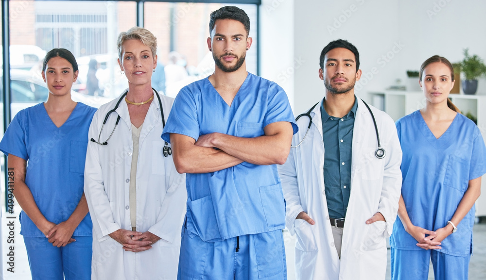 Poster dont judge each day by the harvest you reap. shot of a group of doctors standing against a city back