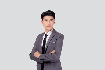 Portrait businessman in suit with crossed his arms standing isolated on white background, young asian business man is manager or executive having confident is positive with success.