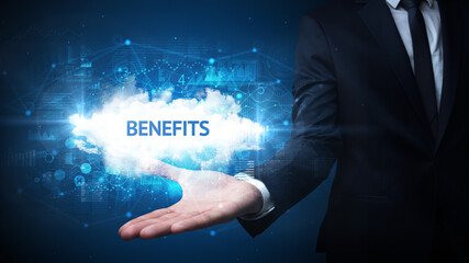 Hand of Businessman holding motivational message