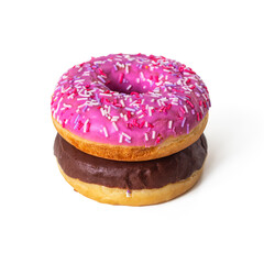 Donut with pink strawberry frosting lies on a donut with chocolate frosting