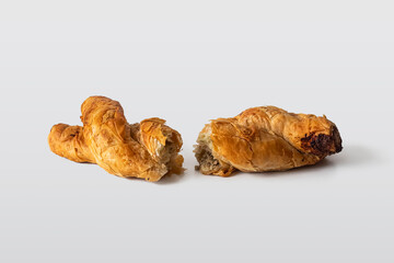 Split in half braided bun stuffed with minced meat