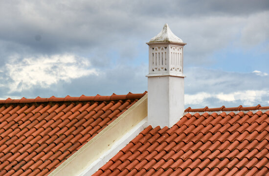Openwork traditional chimney on a roof in Silves, Algarve, Portugal