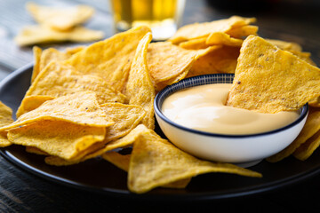 Mexican nacho chips with cheese sauce