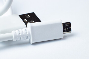 Usb data cable connectors for smartphone isolated on white, close-up.