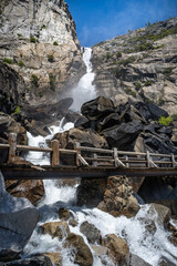 Wapama Falls flows under a bridge, into the Hetch Hetchy Reservoir, in Yosemite National Park, near Merced, California.