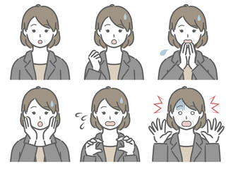 驚く表情の強弱　スーツの中年女性