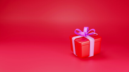 red gift box with ribbon on red background