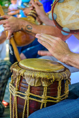 Dum player and other instrumentalists during a Brazilian samba performance at the carnival