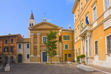 Fototapeta na wymiar Church of Sant Giacomo and G. Rossini Music Conservatory at Piazza Olivieri in Pesaro