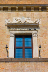 Fototapeta na wymiar Rich decoration of Palazzo Ducale at Piazza Del Popolo in Pesaro, Italy