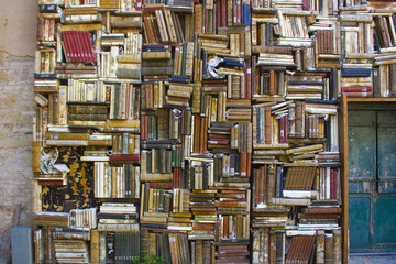 Fragment of Patio of Civic Museum of Palazzo Mosca with a book wall in Pesaro