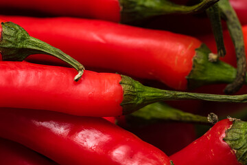 Red hot chilli peppers, close up. Background of red chilies