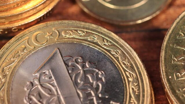 Panning on a one Turkish Lira Coin. Freshly minted money. Macro shooting. Close-Up Macro slow moving slider shot. Business and financial for saving or the investment background concept
