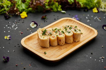 Snacks of pita bread with cheese and tomatoes. Variety mix of small sandwiches on dark background. Photo for restaurant menu