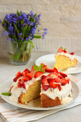 Coconut cake with yogurt and strawberry topping