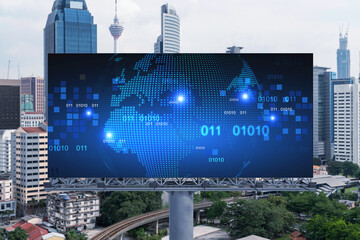 World planet Earth map hologram on billboard over panorama city view of Kuala Lumpur, Malaysia, Asia. The concept of international connections and business.
