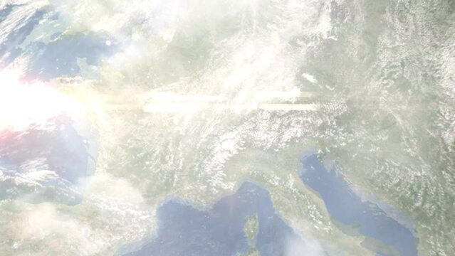 Earth zoom in from outer space to city. Zooming on Thun, Switzerland. The animation continues by zoom out through clouds and atmosphere into space. Images from NASA