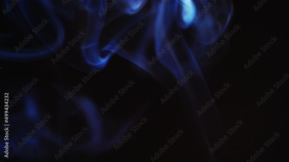 Poster realistic cloud smoke with a streamlined pattern. abstract red smoke on dark background in slow moti