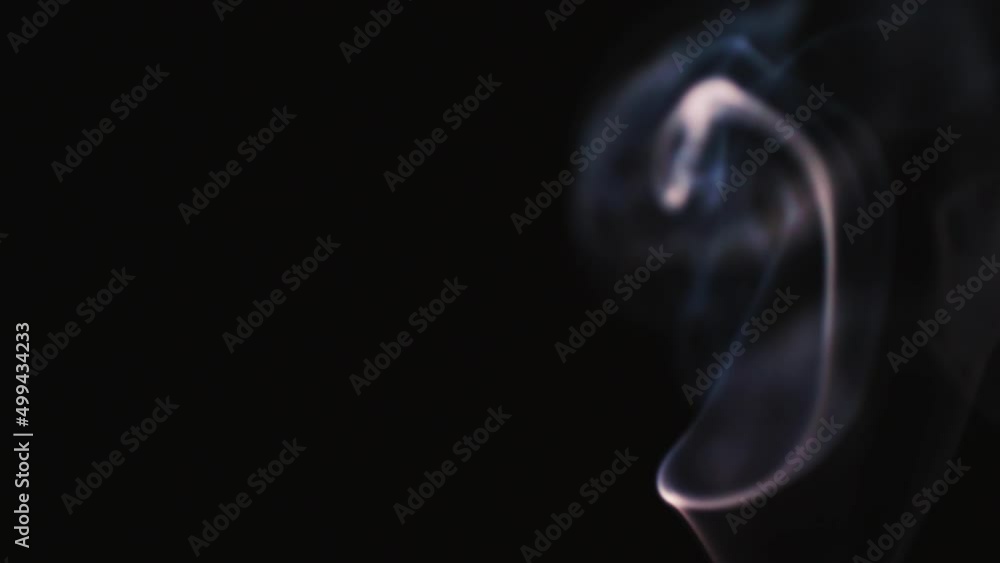 Poster abstract blue color smoke with a black background in slow motion. realistic cloud smoke with a strea