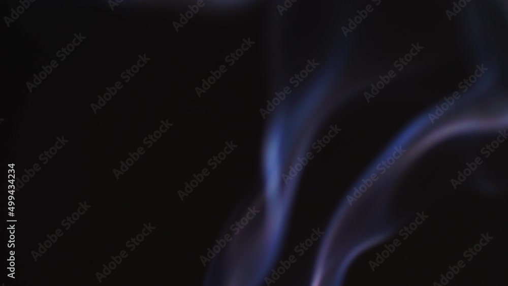 Poster realistic cloud smoke with a streamlined pattern. abstract red smoke on dark background in slow moti