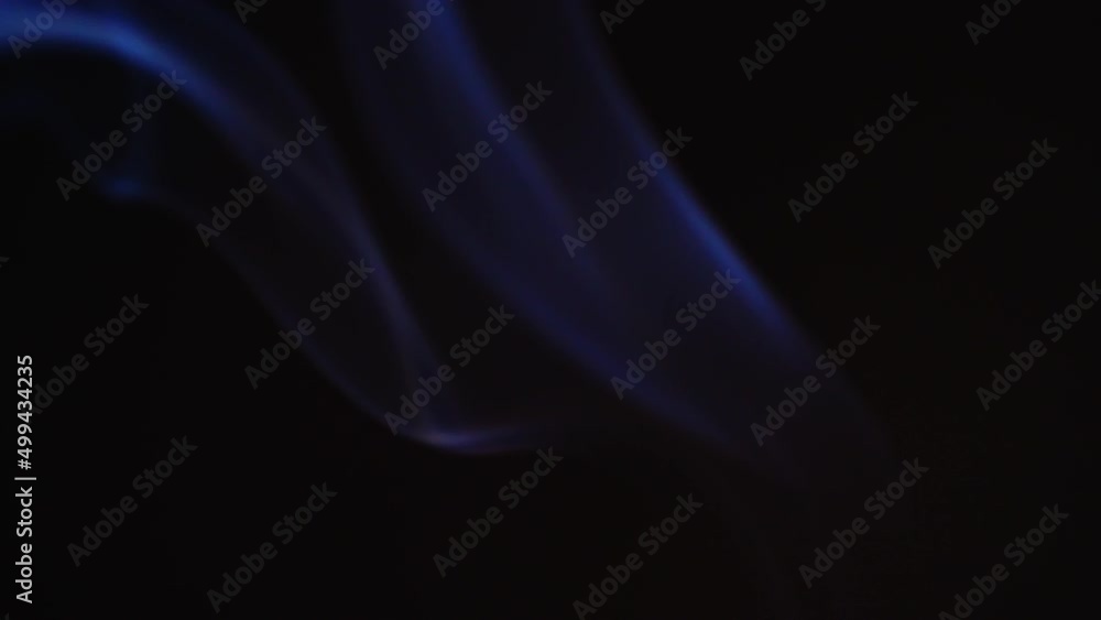 Poster realistic cloud smoke with a streamlined pattern. abstract red smoke on dark background in slow moti