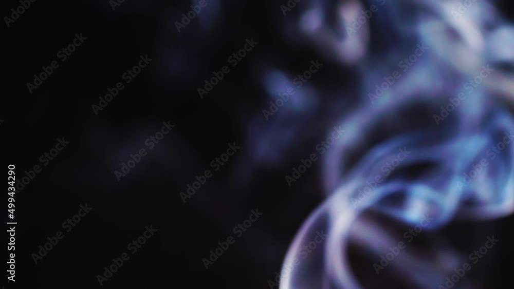 Poster realistic cloud smoke with a streamlined pattern. abstract red smoke on dark background in slow moti