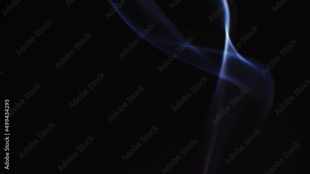 Poster abstract blue color smoke with a black background in slow motion. realistic cloud smoke with a strea