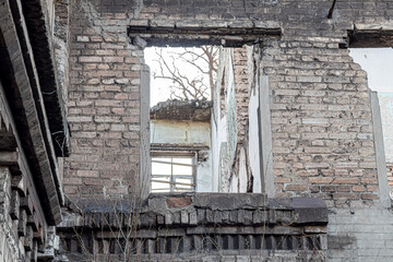 Abandoned and destroyed houses in the villages of Ukraine. Because of war. Departure from the...