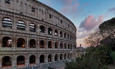 Rome Italy ; 03 28 2022 ; Photograph of the Colosseum in Rome with some very beautiful sunset skies