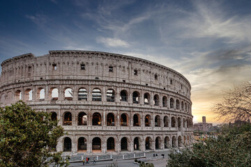 Rome Italy ; 03 28 2022 ; Photograph of the Colosseum in Rome with some very beautiful sunset skies