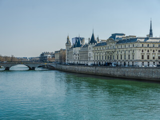 Fototapeta na wymiar Pont au Change and Louvre palace on river Seine