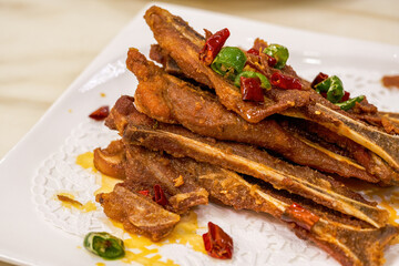 A crispy and delicious Guangxi dish, pork fan bone with salt and pepper