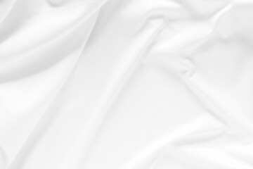 White fabric texture background. Cloth soft wave. Creases of satin, silk, and cotton.