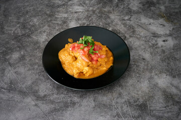 Assorted Indian dishes of rice and curry on wooden background