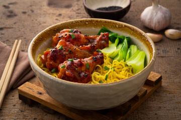 Honey roasted drummet chicken bbq with Chinese Egg Noodles in a bowl