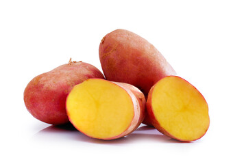 Clean ripe potato tubers isolated on white background. Washed red potato tubers.