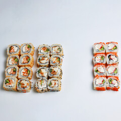 Assorted sushi set on white background.