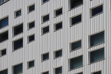 Windows on the facade of the building, in a modern minimalist architectural style