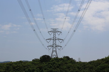 the transmission tower against the blue sky in Hong Kong