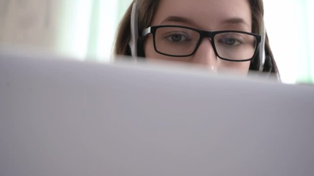 Close-up girl call center operator sells services. Call center. 