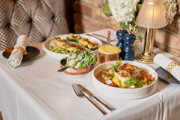 Set for two of seafood for dinner, Grilled shrimps or prawns served with lemon, garlic and sauce